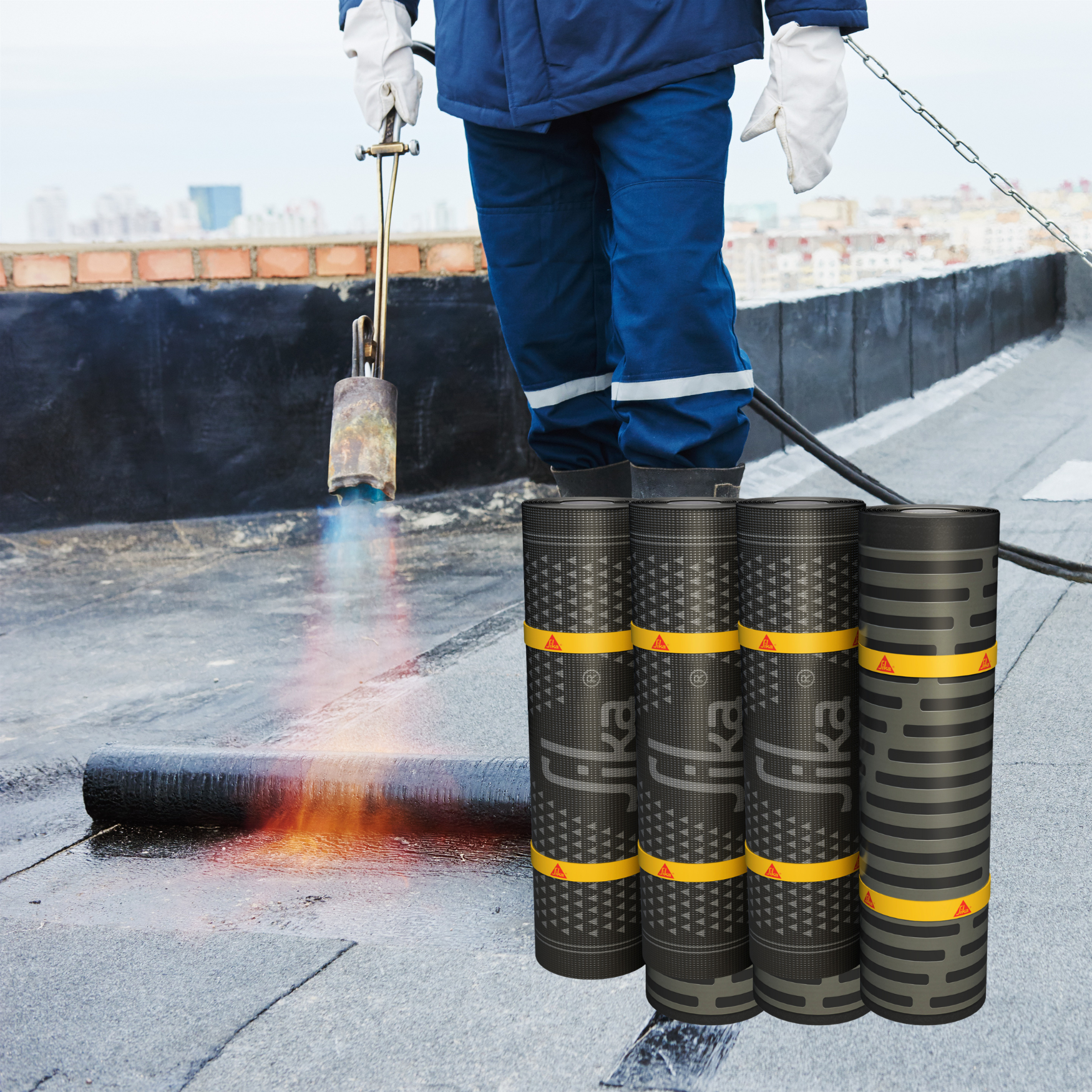 Person working on a roof with rolls of Sika roofing material.