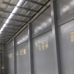 Industrial interior with metallic walls and ceiling